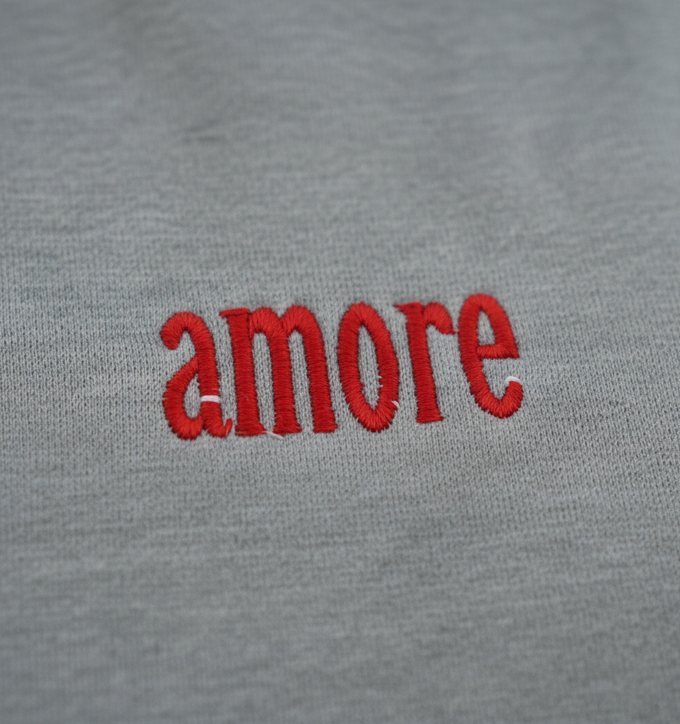 Gray fabric with red 'amore' embroidery